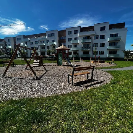 U Satoshiho * 奥洛穆茨